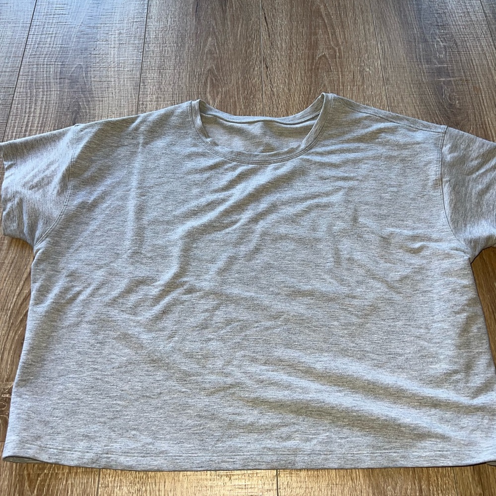 Grey short sleeve lululemon shirt size 8